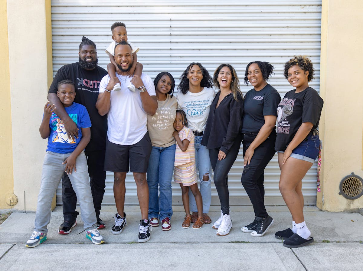Happy African American family smiling outdoors together